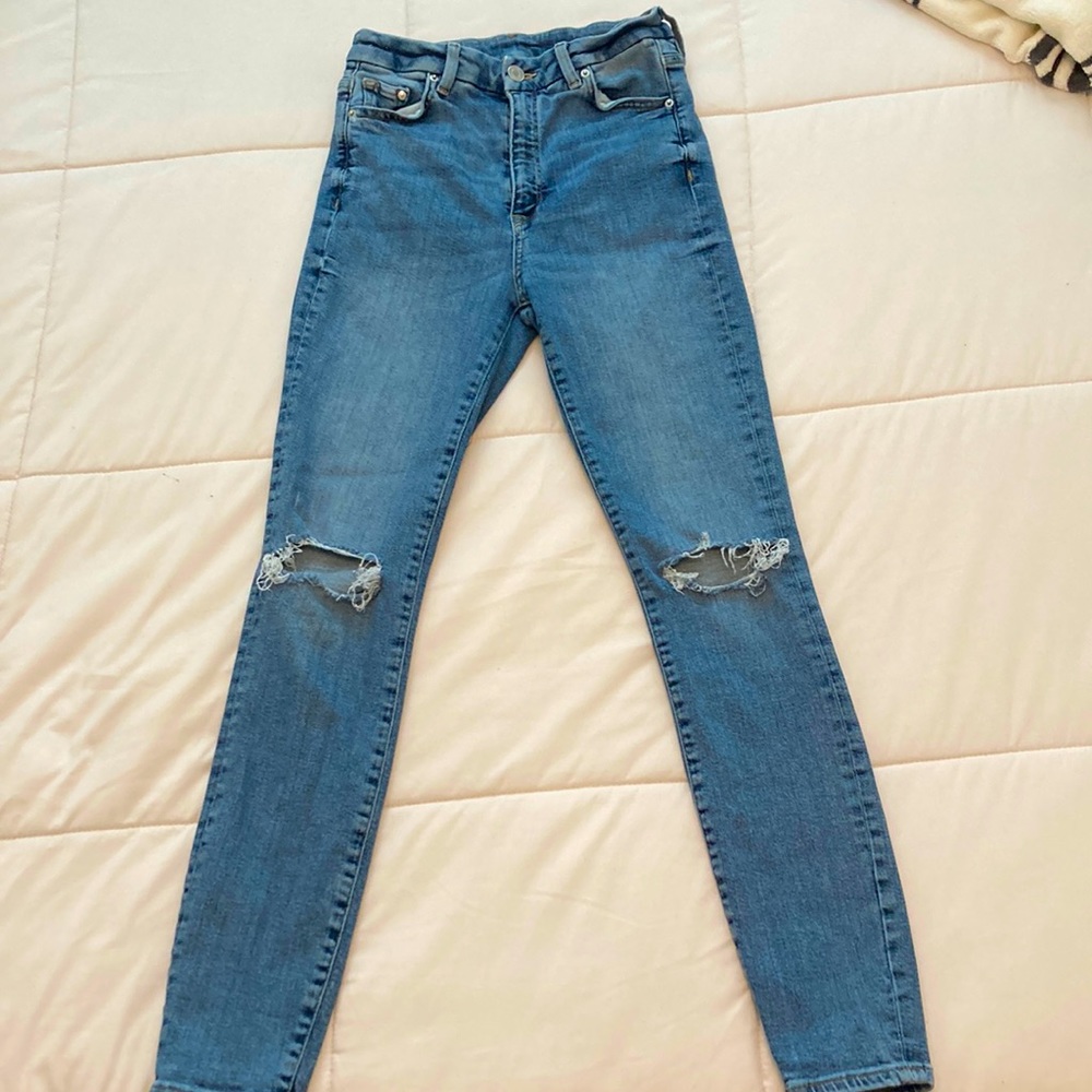 Skinny, Soft, Blue denim jeans with holes in knees